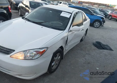 2003 Toyota Camry Le z USA, uszkodzony, nr VIN 4T1BE32K03U148605